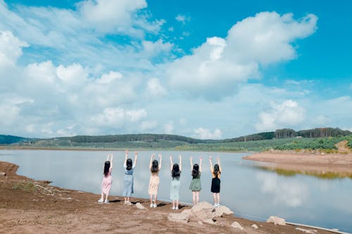 Six Women Raising Their Both Hands