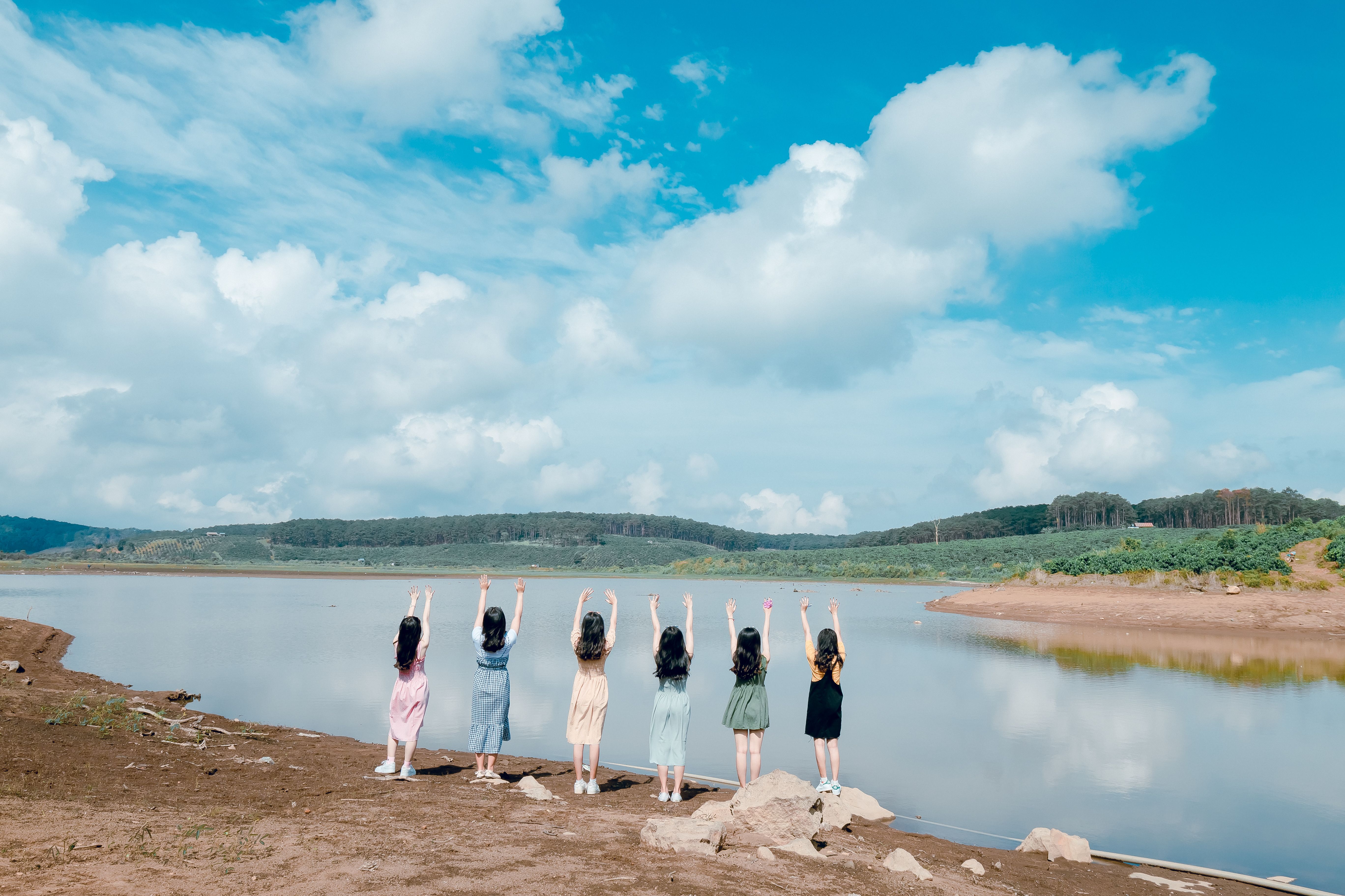 women-standing-near-river-free-stock-photo