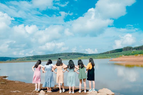 Six Girl's Standing in Front of Lake