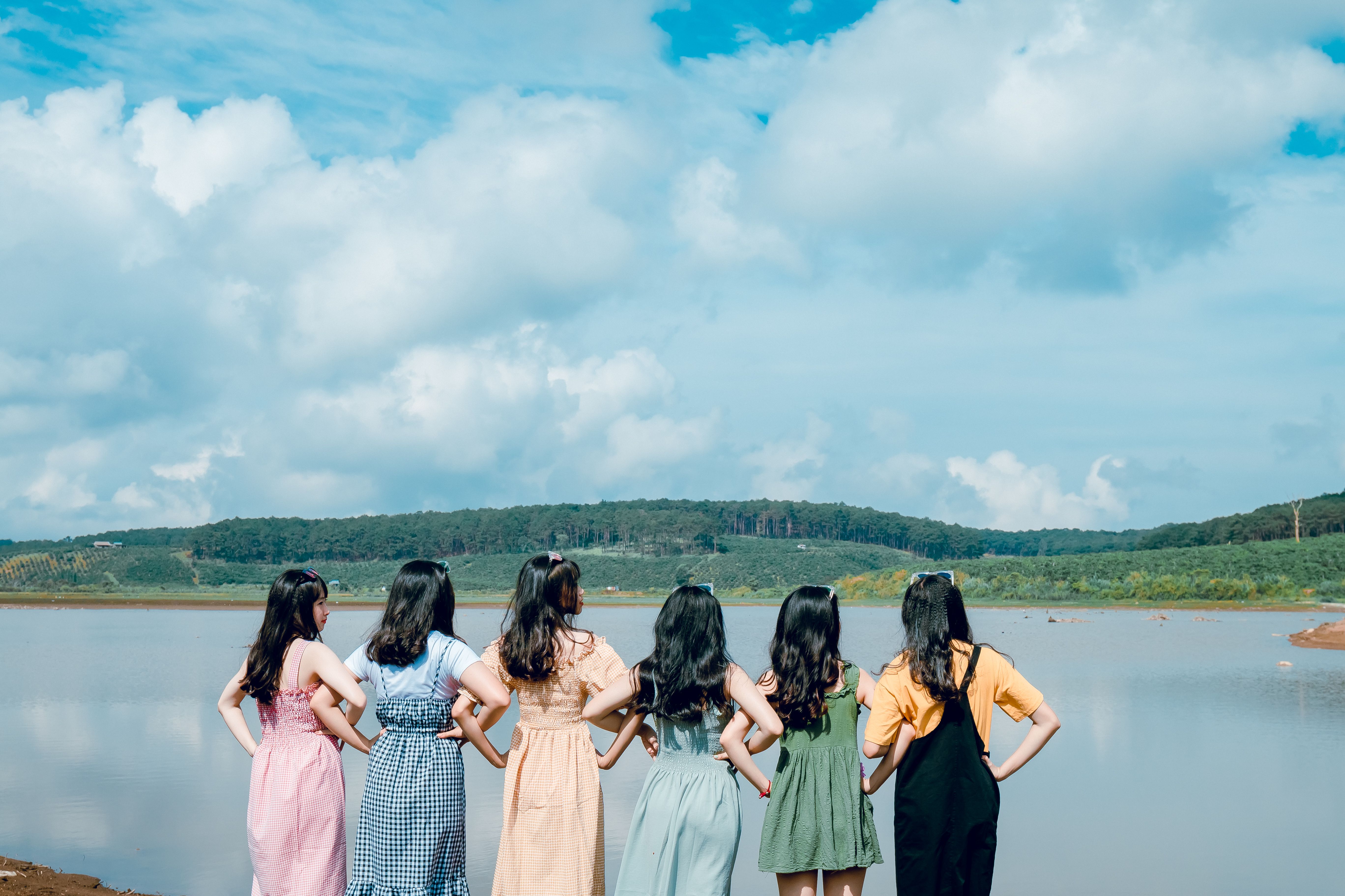 women-standing-near-river-free-stock-photo