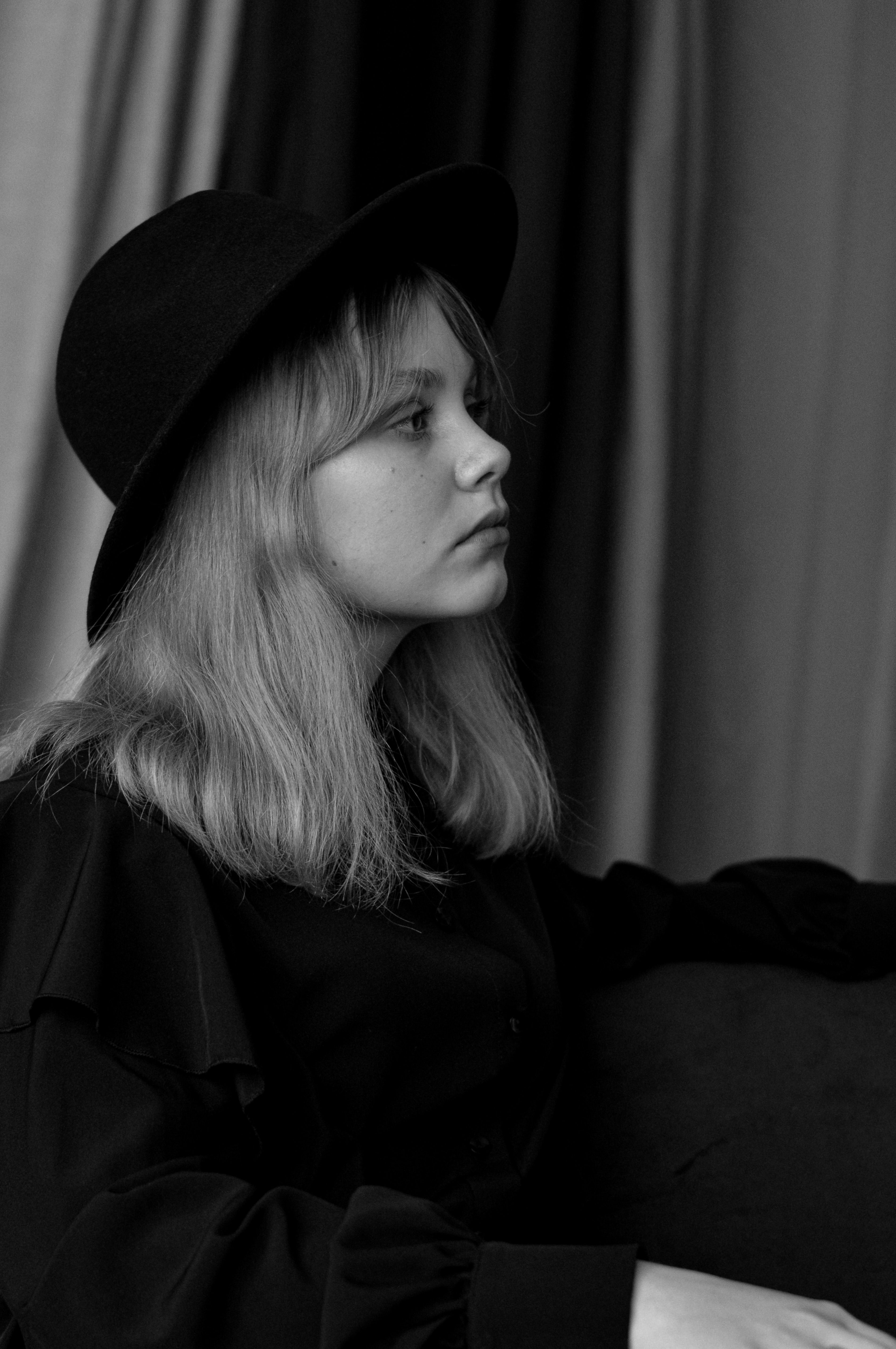 Black and White Photo of Woman Wearing a Hat · Free Stock Photo