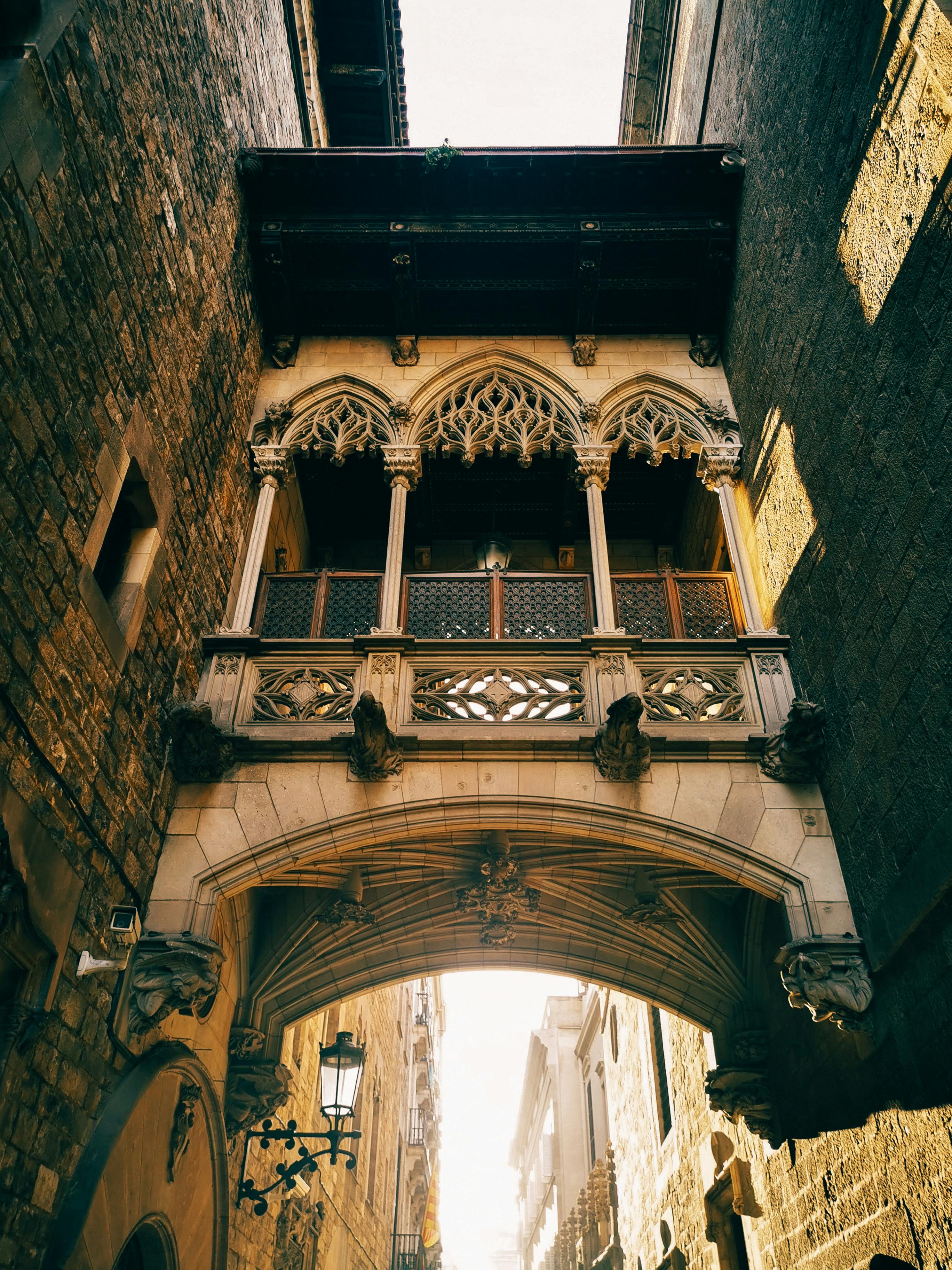 footpath above carrer del bisbe street in barcelona spain