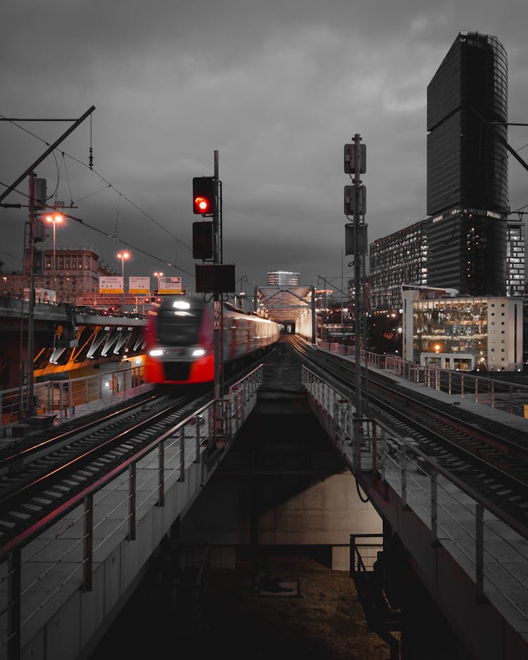 Bridge Railway Tracks In A City At Dusk 