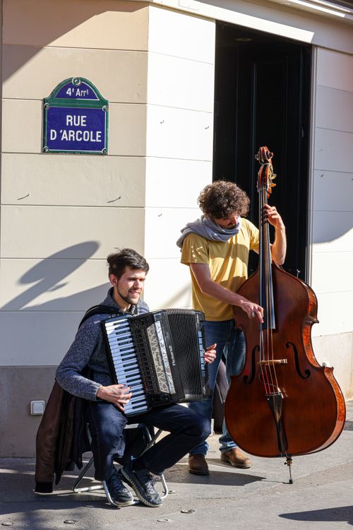 Men Playing Musical Instruments on the Street · Free Stock Photo
