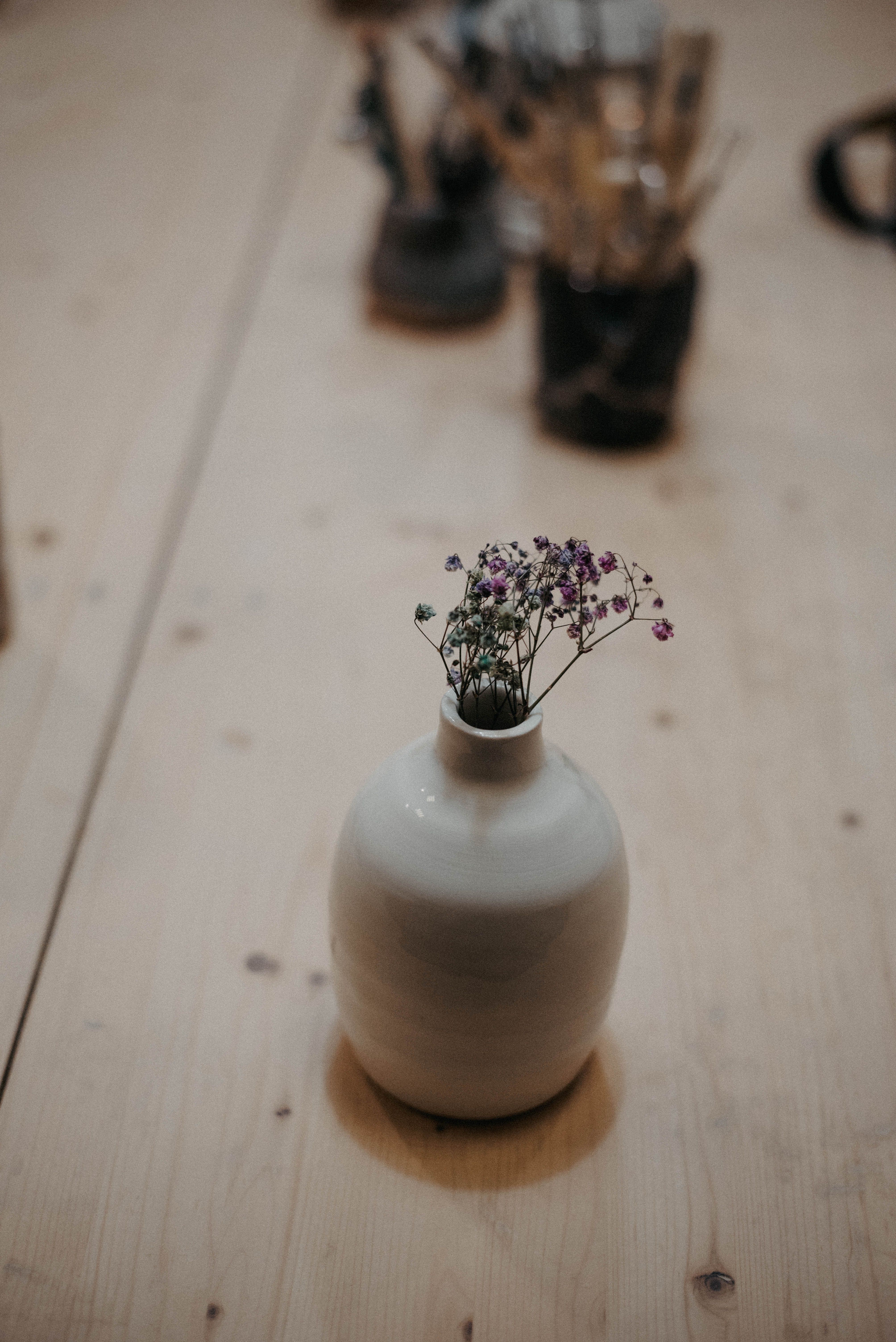 Mirena bud vase in bone porcelain holding small flowers