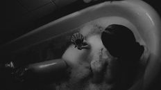Woman in Bathtub With Water