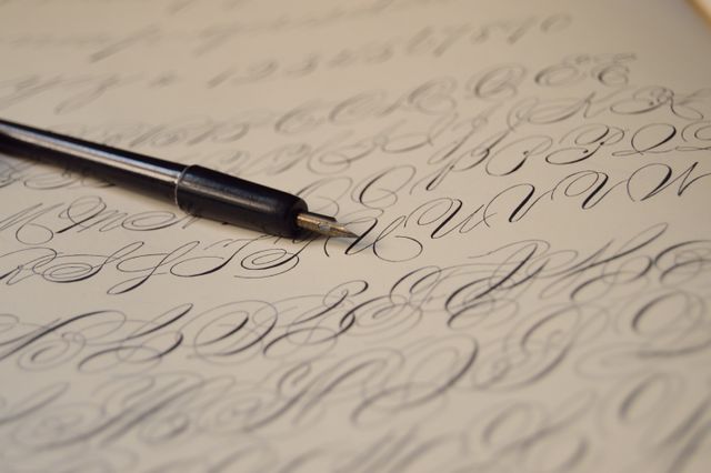 Calligraphy written with a fountain pen — photo by Miguel Á. Padriñán on Pexels