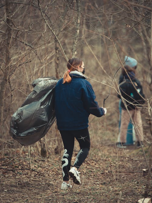 People Cleaning Forest from Garbage