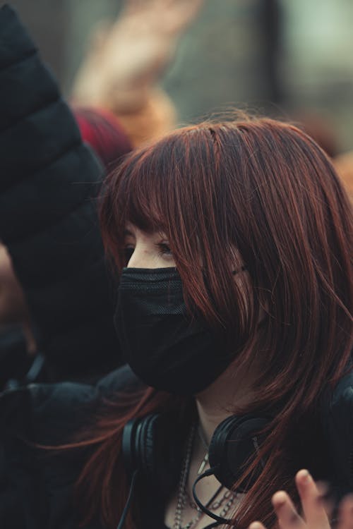 Free Close Up Photo of Woman Wearing a Face Mask Stock Photo