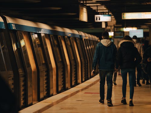 People Walking on Subway Platform