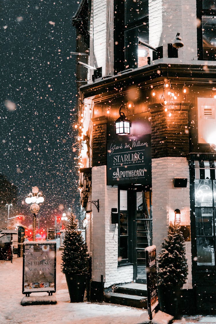 Corner Store Entrance During Snowstorm