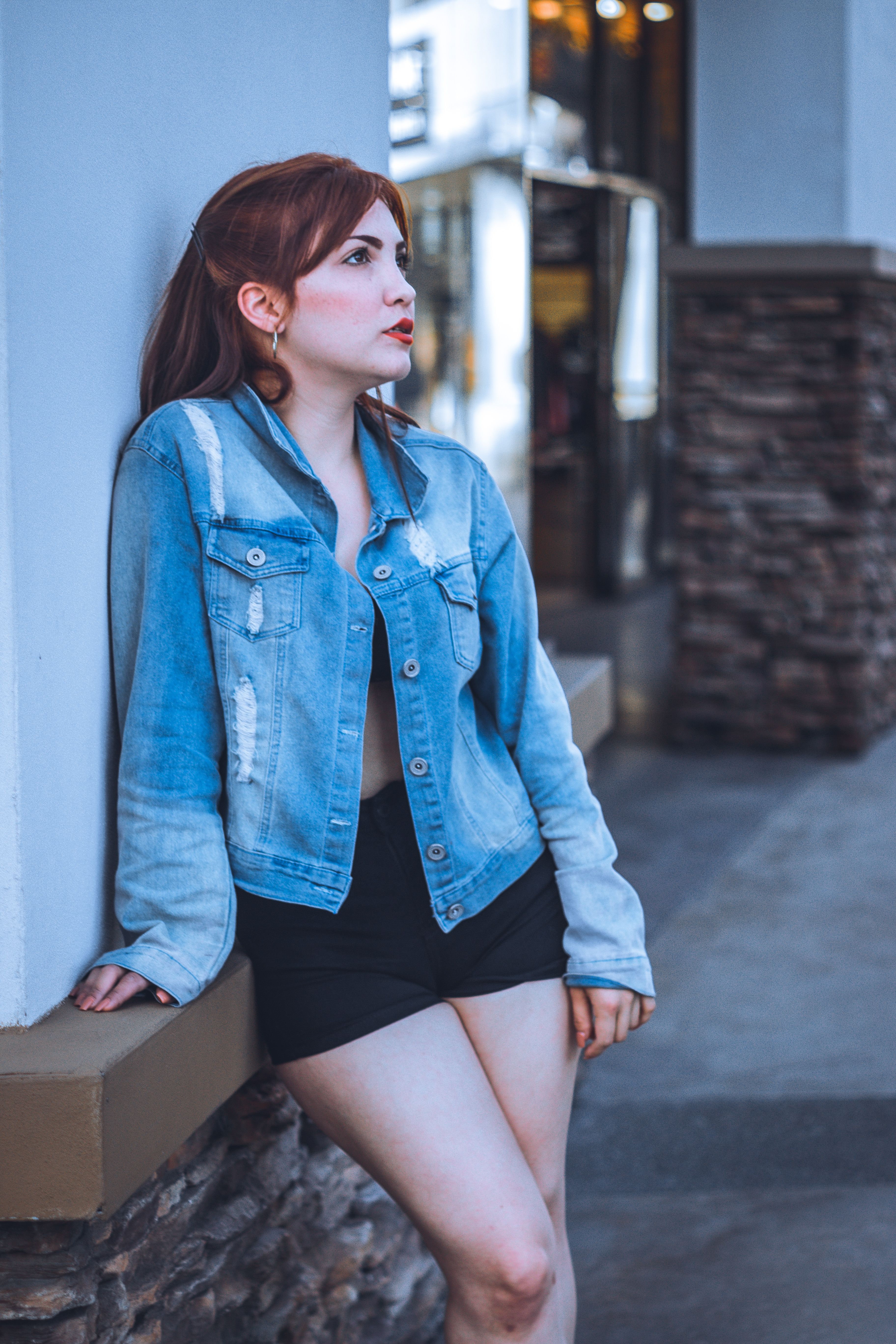 Woman in Blue Denim Jacket and Black Shorts · Free Stock Photo