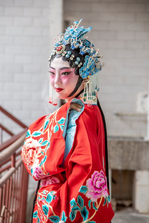 A Woman in Red Floral Traditional Clothes