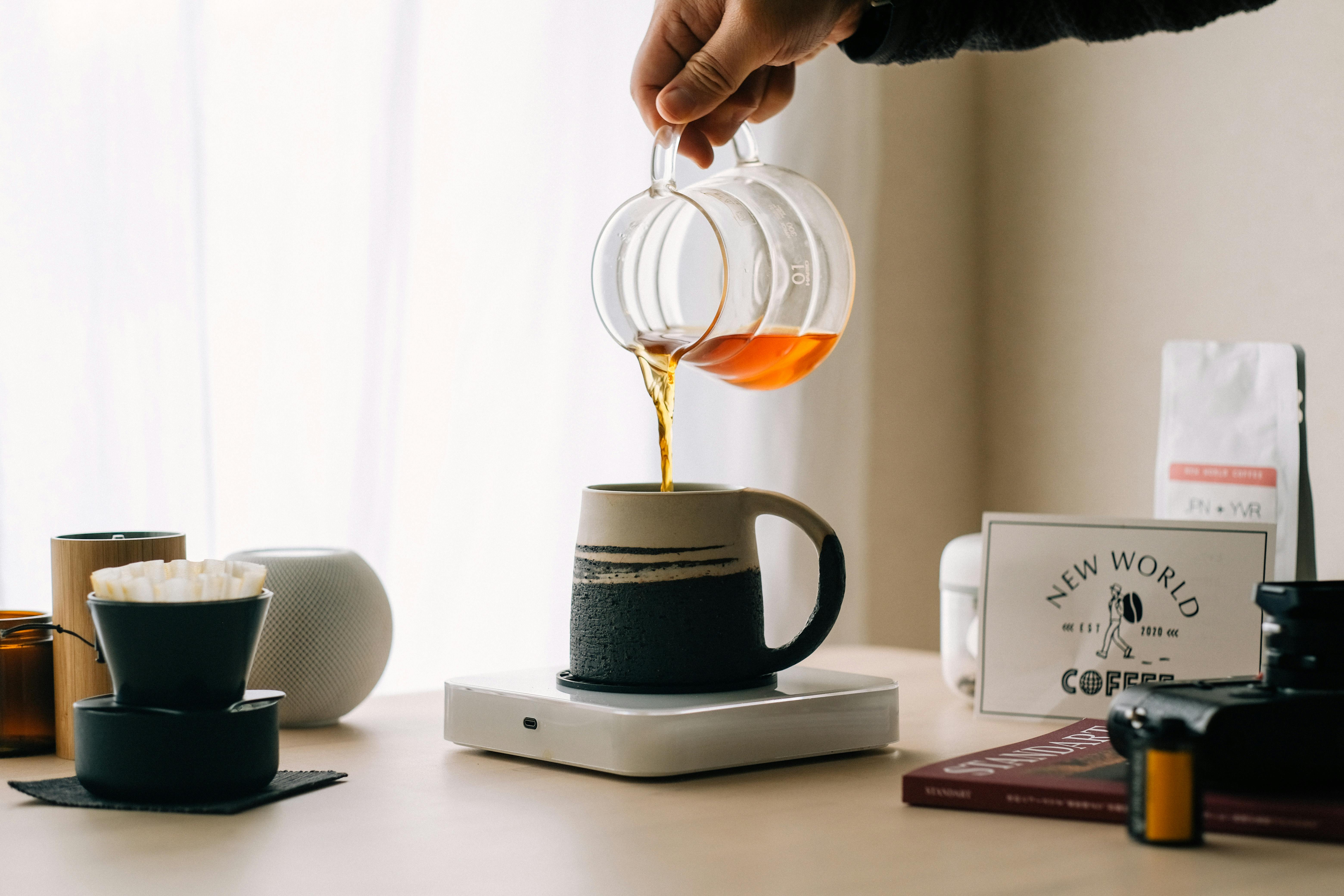 Premium Photo  Workplace with coffee cup, spinner and book