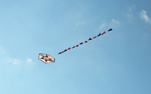 hexagonal kite in the sky with long tail