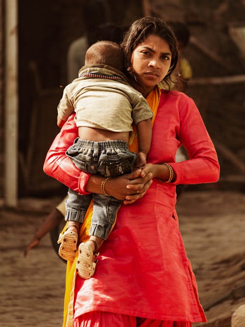 Woman Carrying a Child