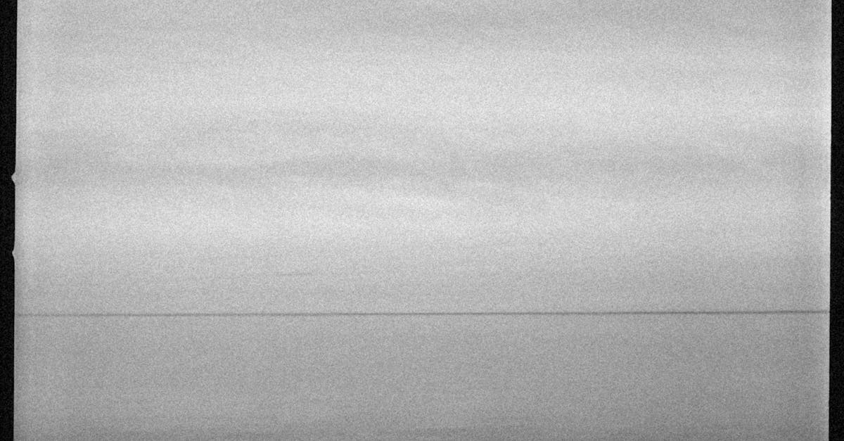 Grayscale Photo of Ripples on Water Surface · Free Stock Photo