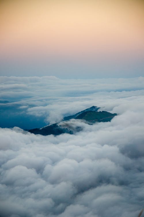 Free Aerial View of a Mountain Near the Clouds Stock Photo