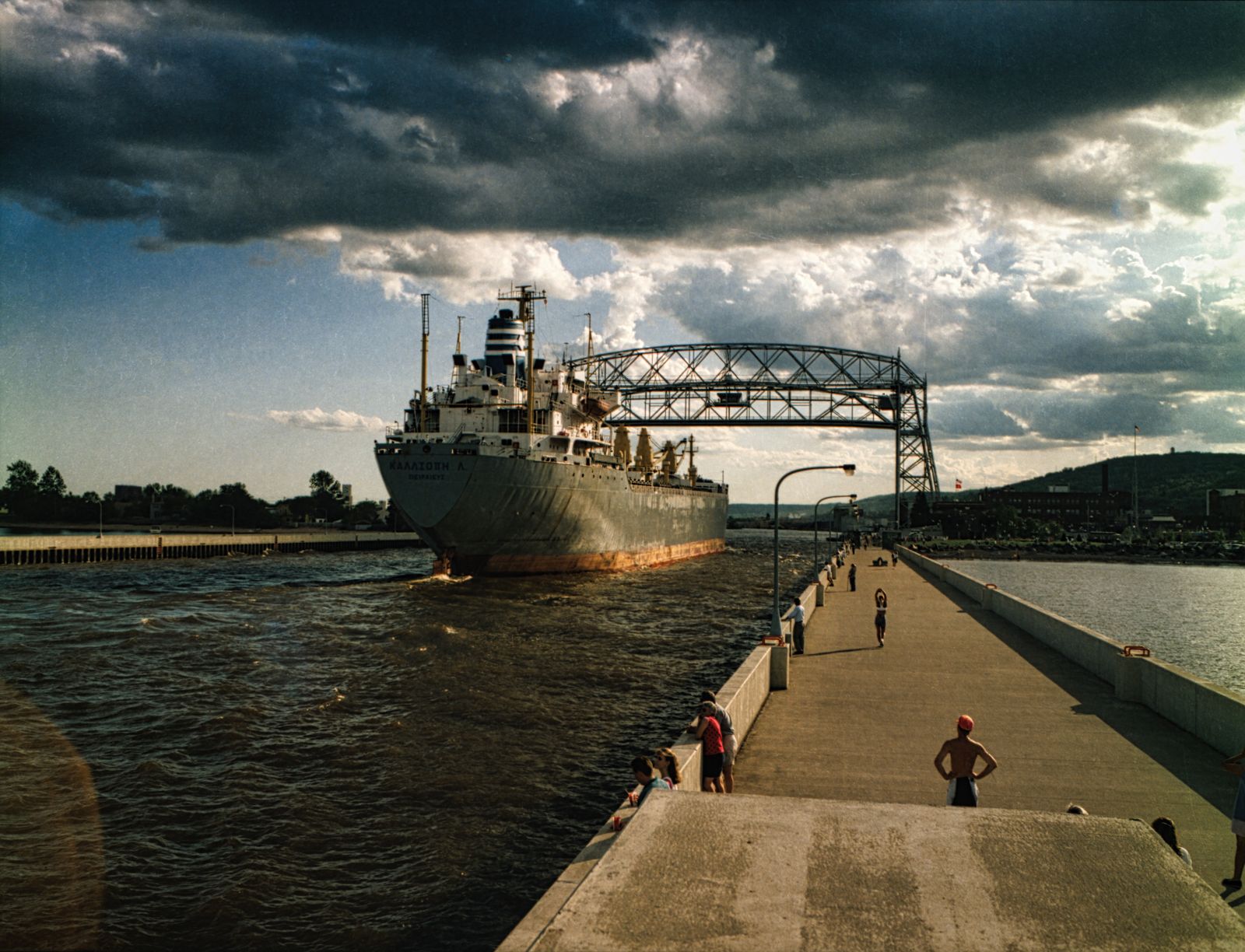 Cargo ship passing under the Aerial Lift Bridge in Duluth, Minnesota