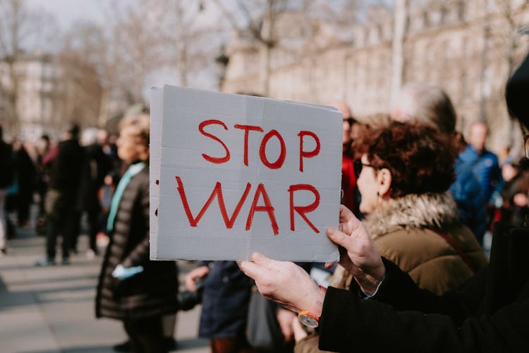 Sign Stop War On Protest Against War 