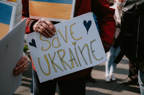 Free Sign Save Ukraine on Protest Against War in Ukraine  Stock Photo