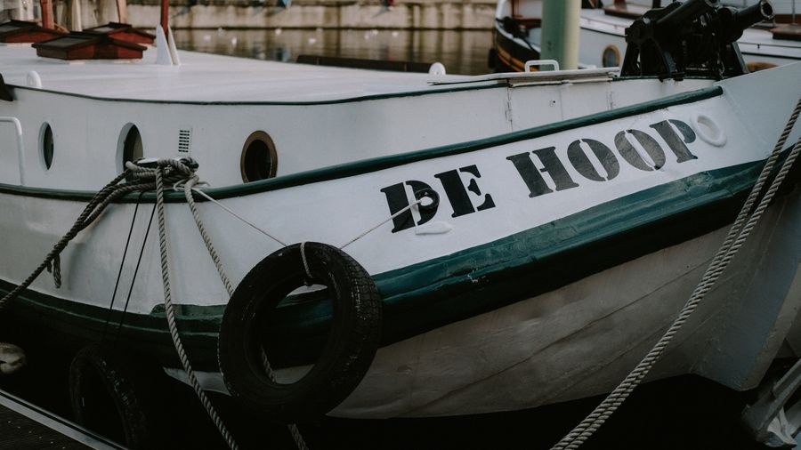 Bow of a moored fishing boat in the harbour
