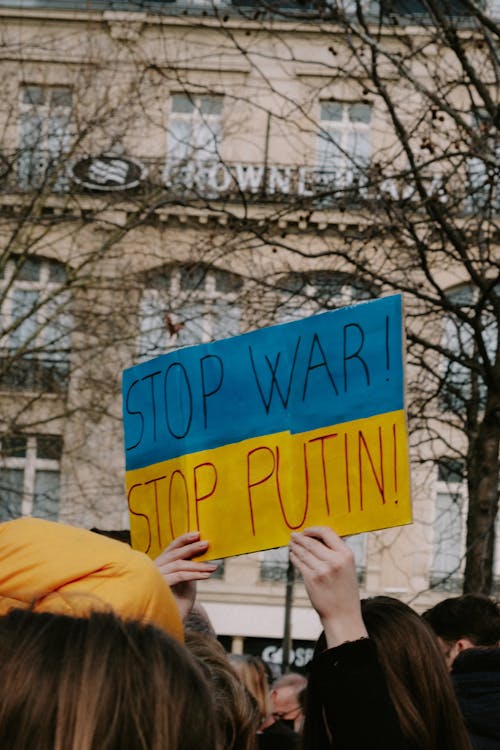 Protester Holding a Placard