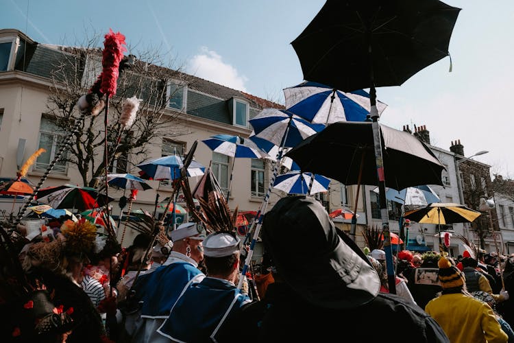 Crowd Standing On Festival In Town