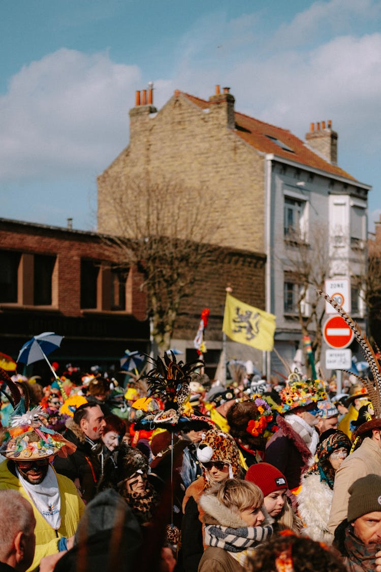 Crowd Standing On A Street 