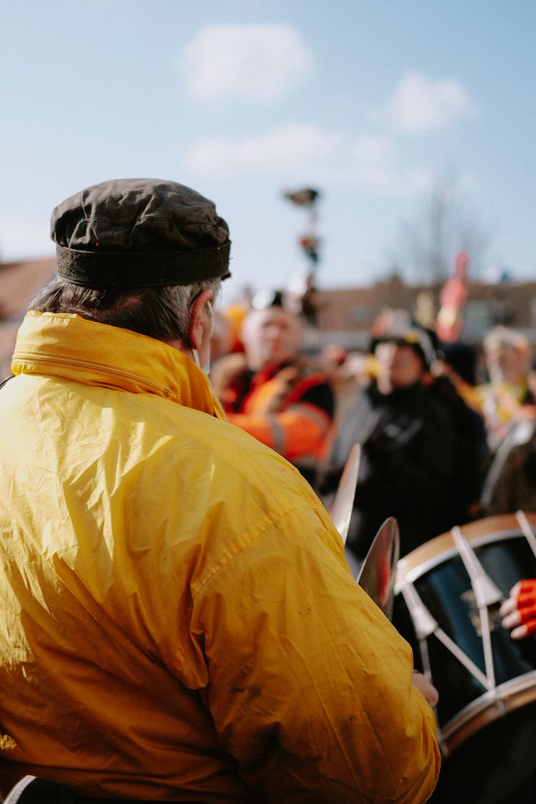 Back Of A Man Walking In A Parade