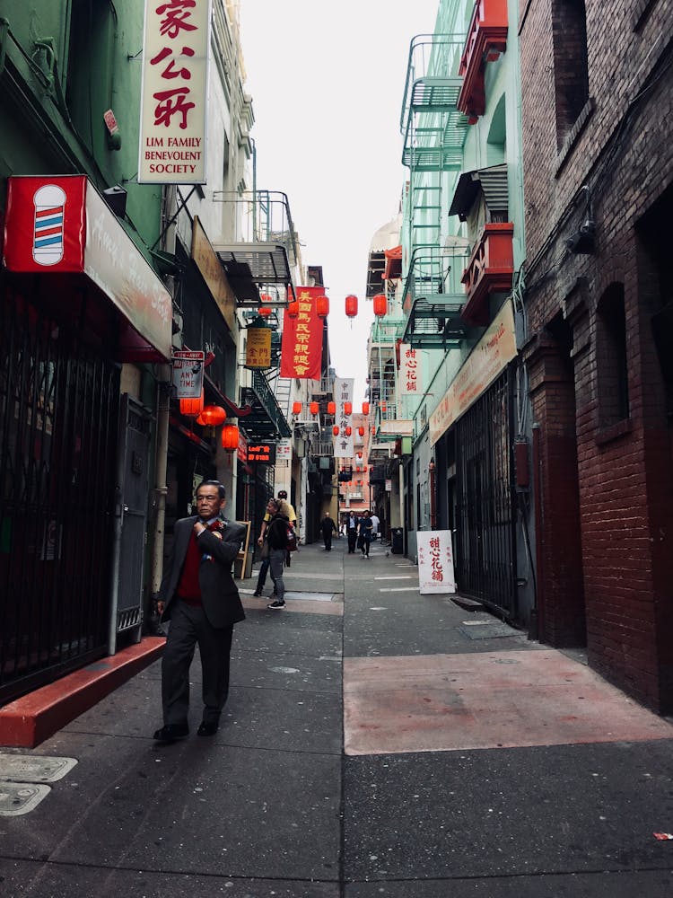 People On A Narrow Alley