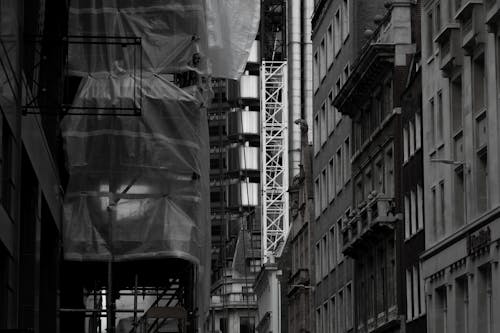 Black and White Photos of Buildings during Renovation