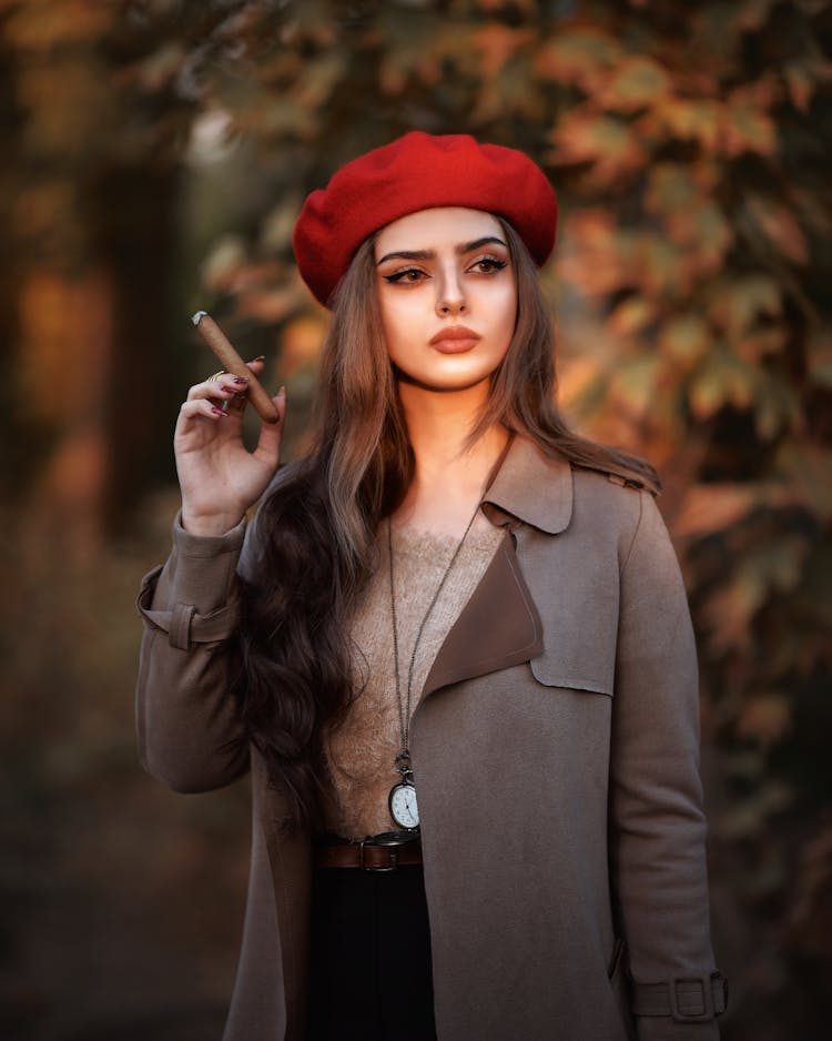 A Woman Smoking A Cigar