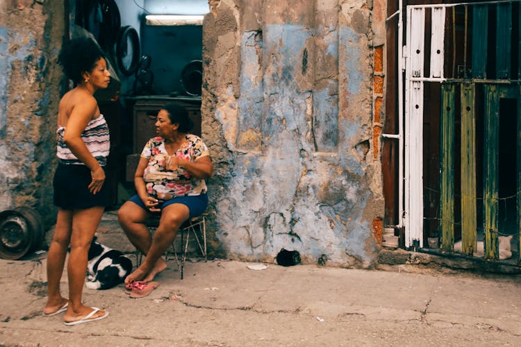 Women Outside A Building