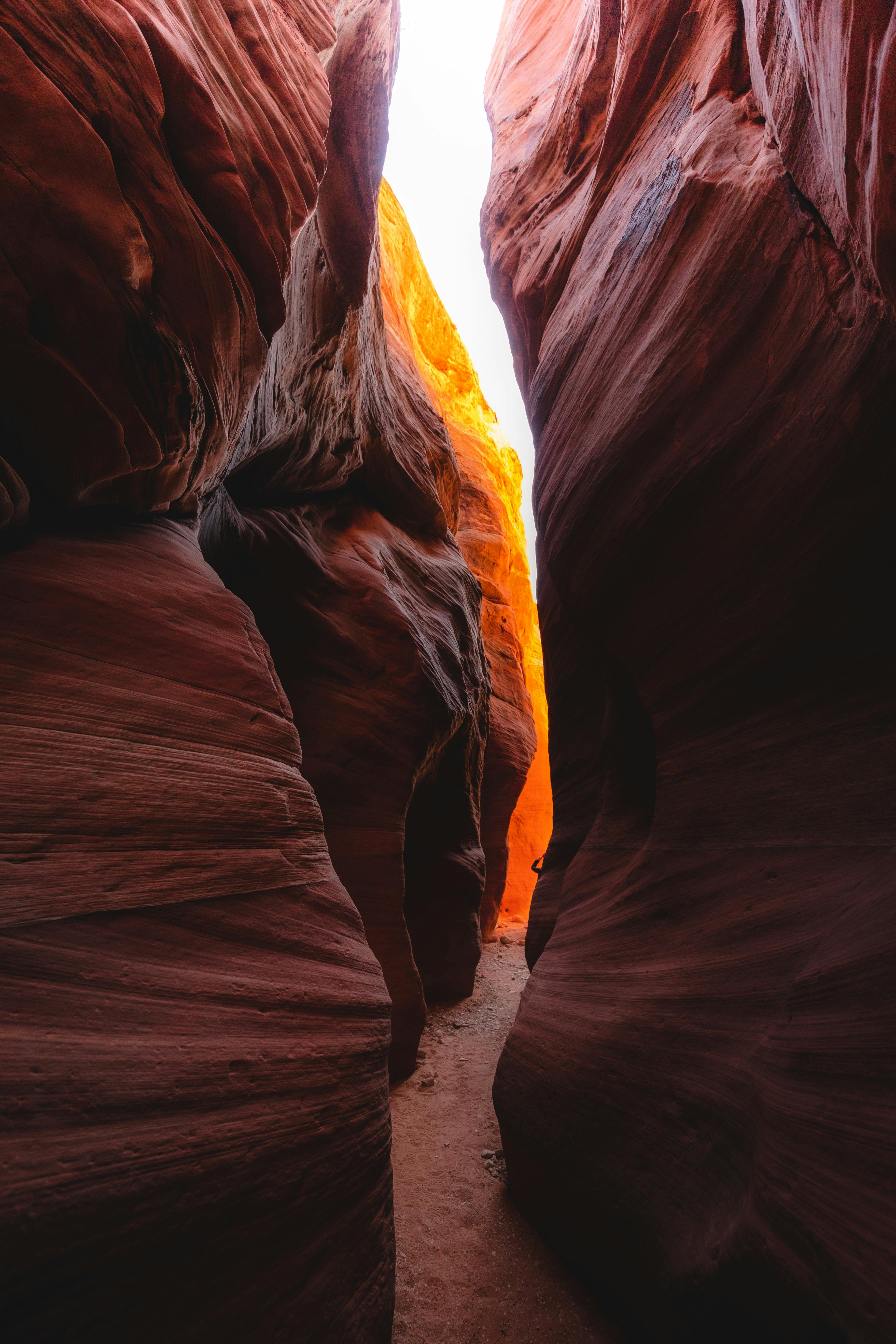 narrow passage in rock formation near petra in jordan