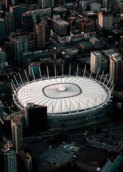Aerial view showcasing the impressive architecture of BC Place Stadium amidst Vancouver's urban skyline.