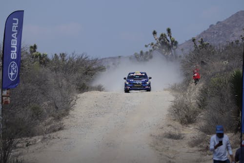 A Blue Car on a Subaru Race Event 