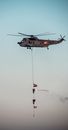 Yellow and Red Helicopter Flying