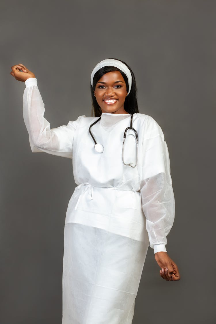 Doctor In Protective Clothes Posing