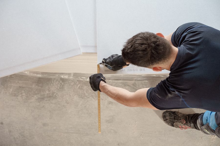 Measuring panels for the studio's oak floor
