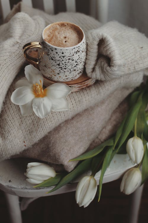 Free A Cup of Coffee and Flowers Stock Photo