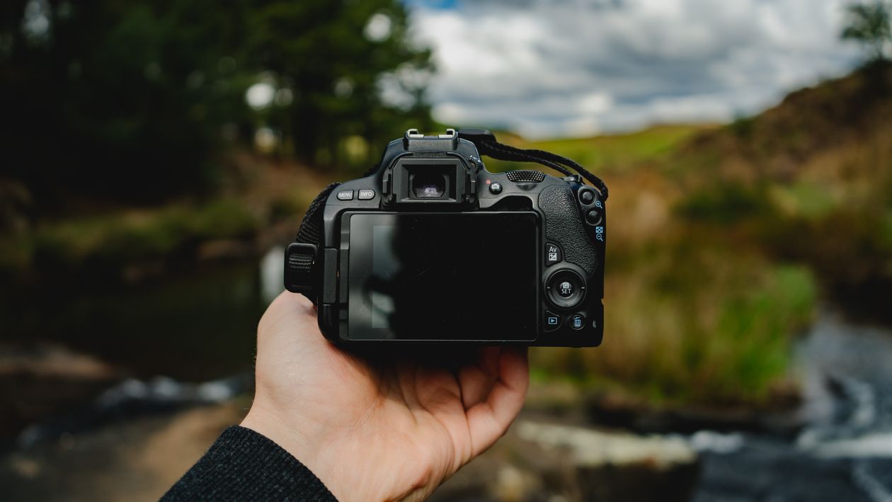 Hand Holding Camera · Free Stock Photo