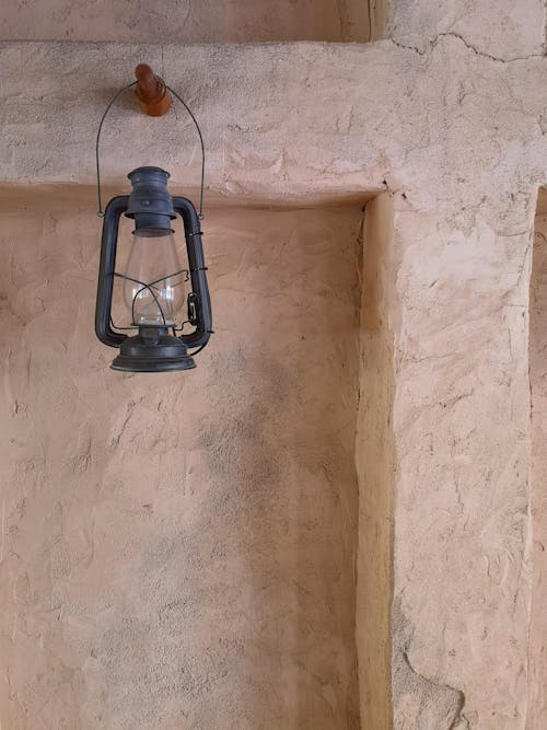 Lantern Hanging on Concrete Wall