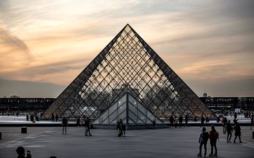 People Walking in Front of Louvre Museum