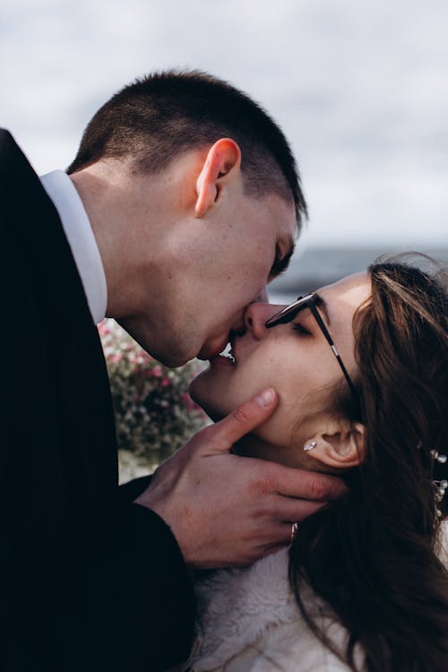 Close-Up Shot of a Couple Kissing 