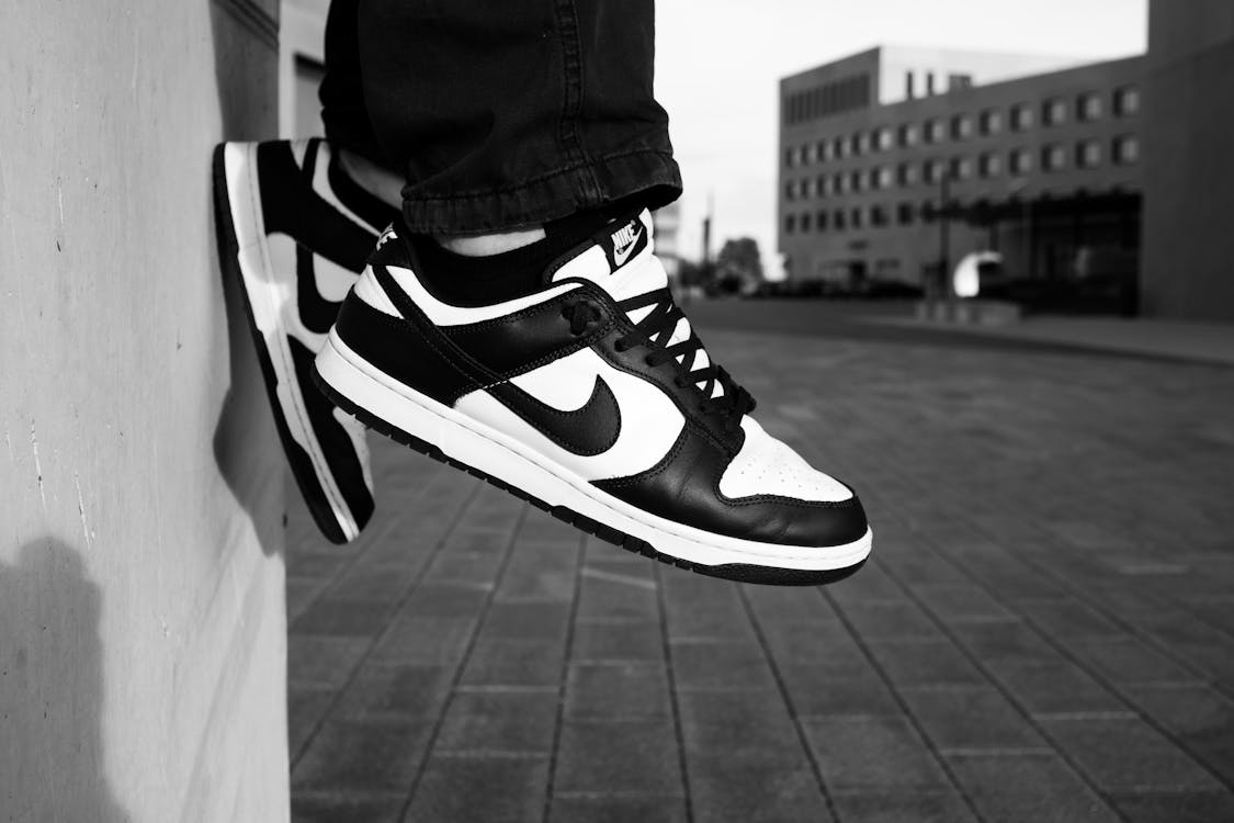 A Person Black and White Sneakers · Free Stock Photo