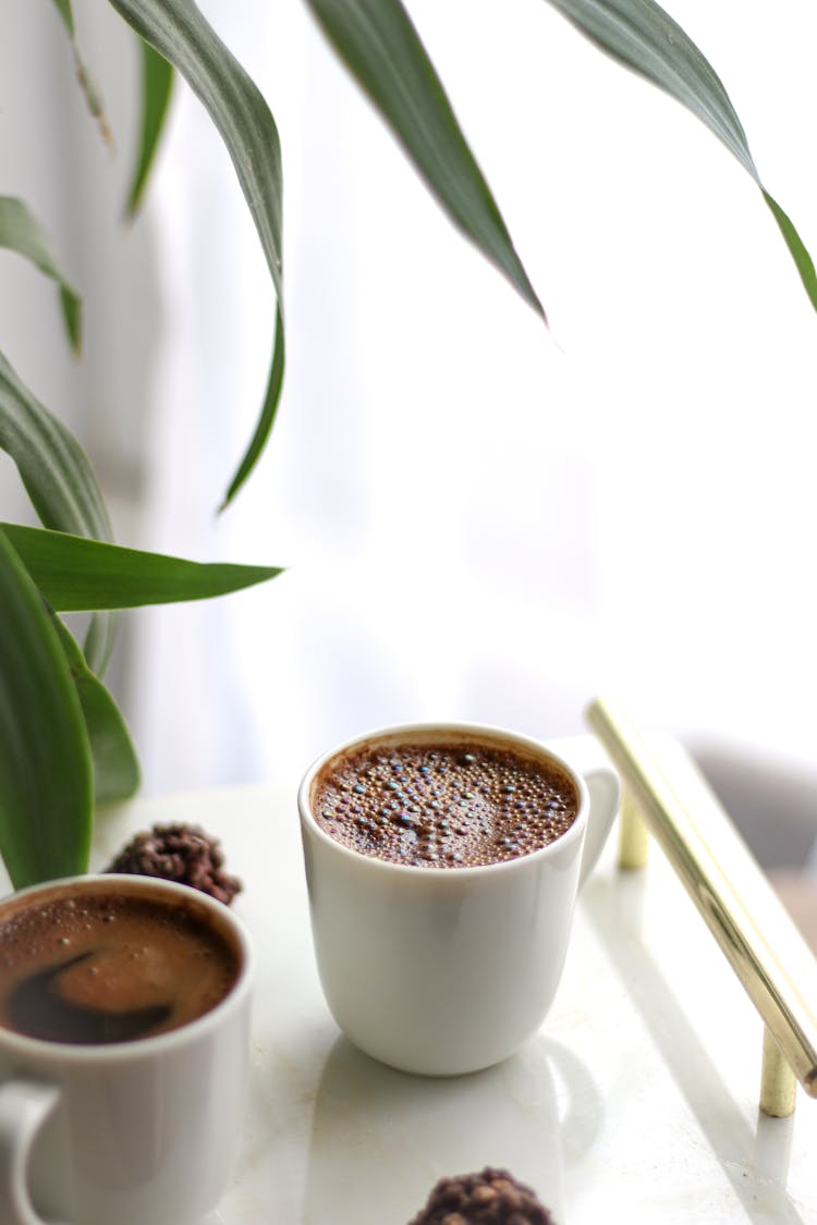 Coffee On White Ceramic Cups