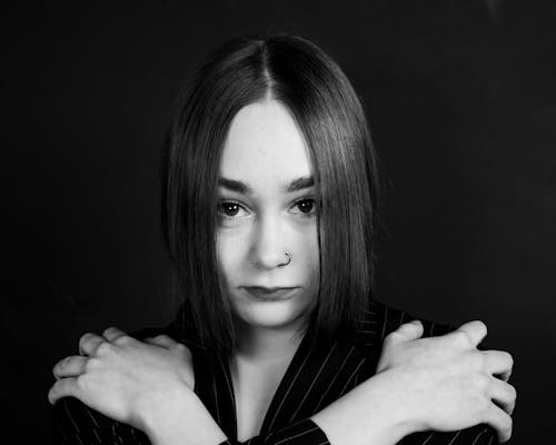 Grayscale Photo of Woman in Black Blazer