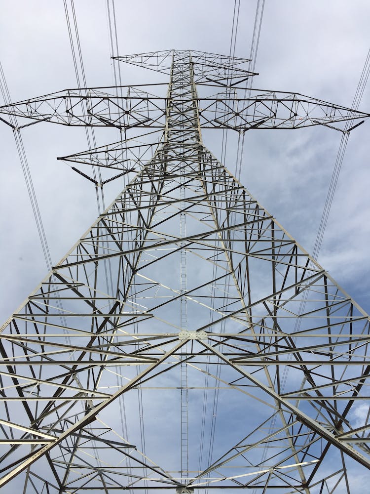 Steel Electricity Pylon On Blue Sky