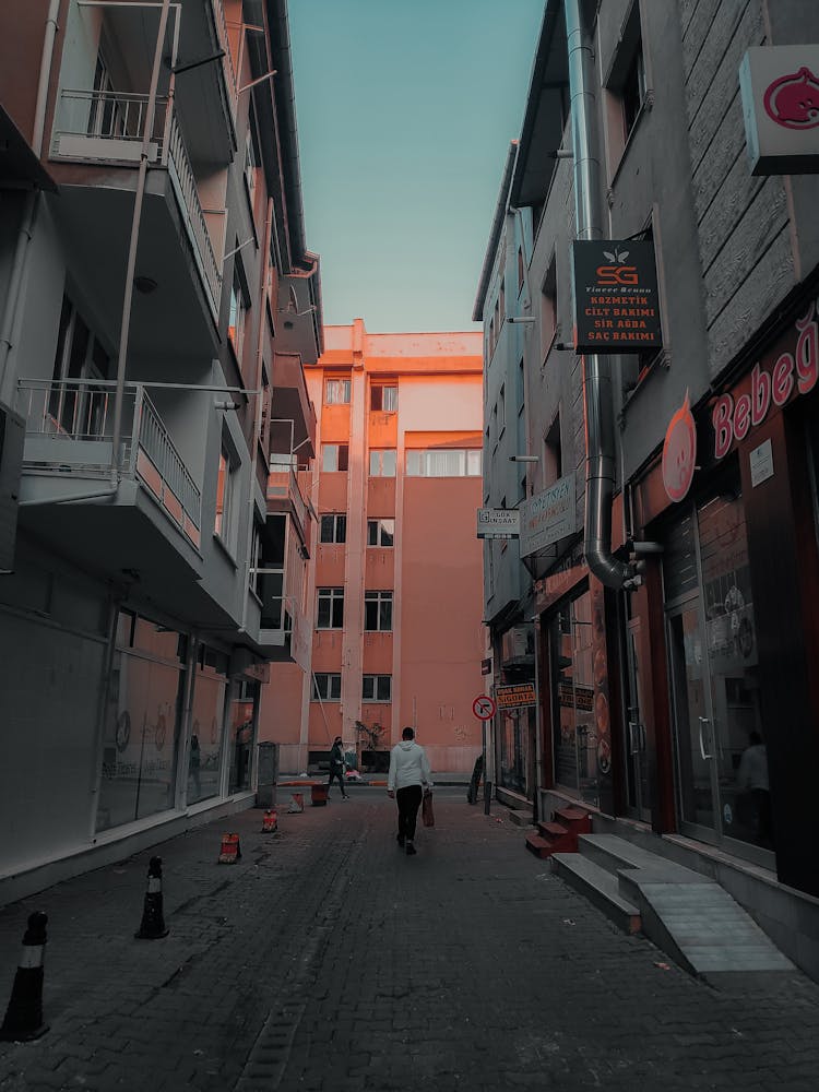 Person Walking On An Alley